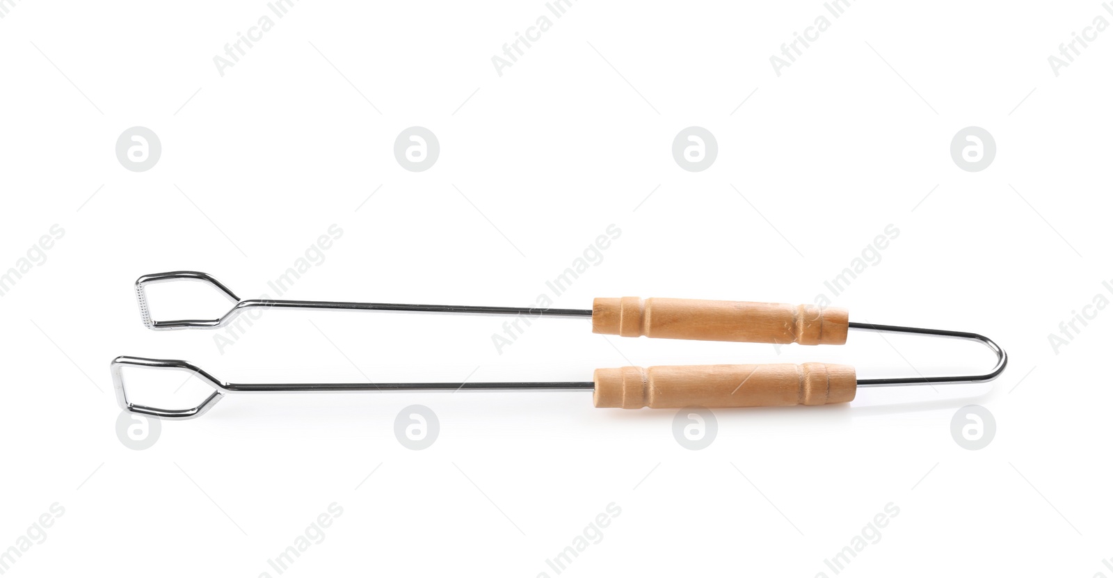 Photo of New barbecue tongs with wooden handle on white background