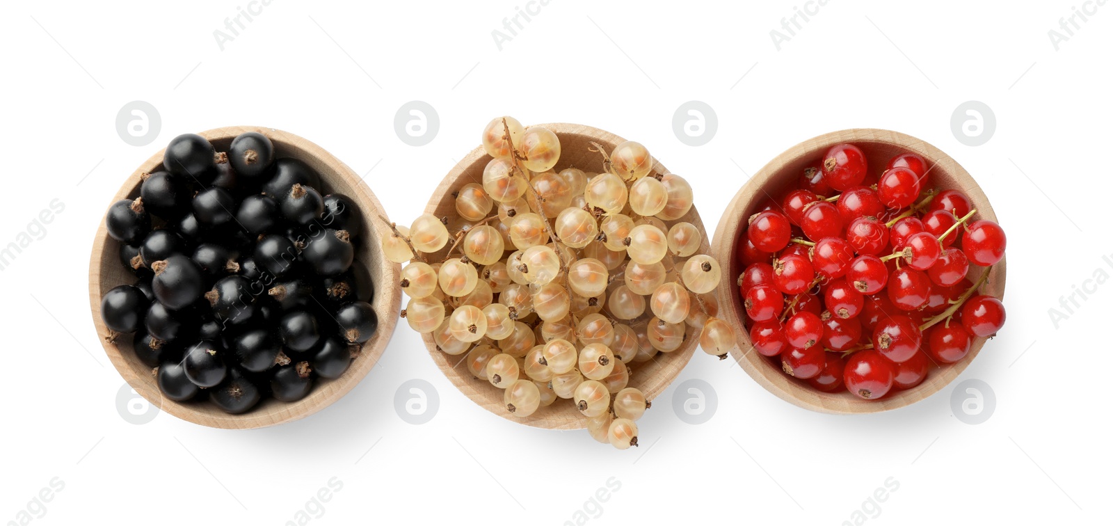 Photo of Fresh red, white and black currants in bowls isolated on white, top view