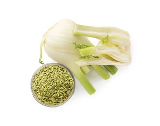 Fennel bulbs and seeds in bowl isolated on white, top view
