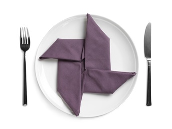 Beautiful table setting with cutlery and purple napkin on white background, top view