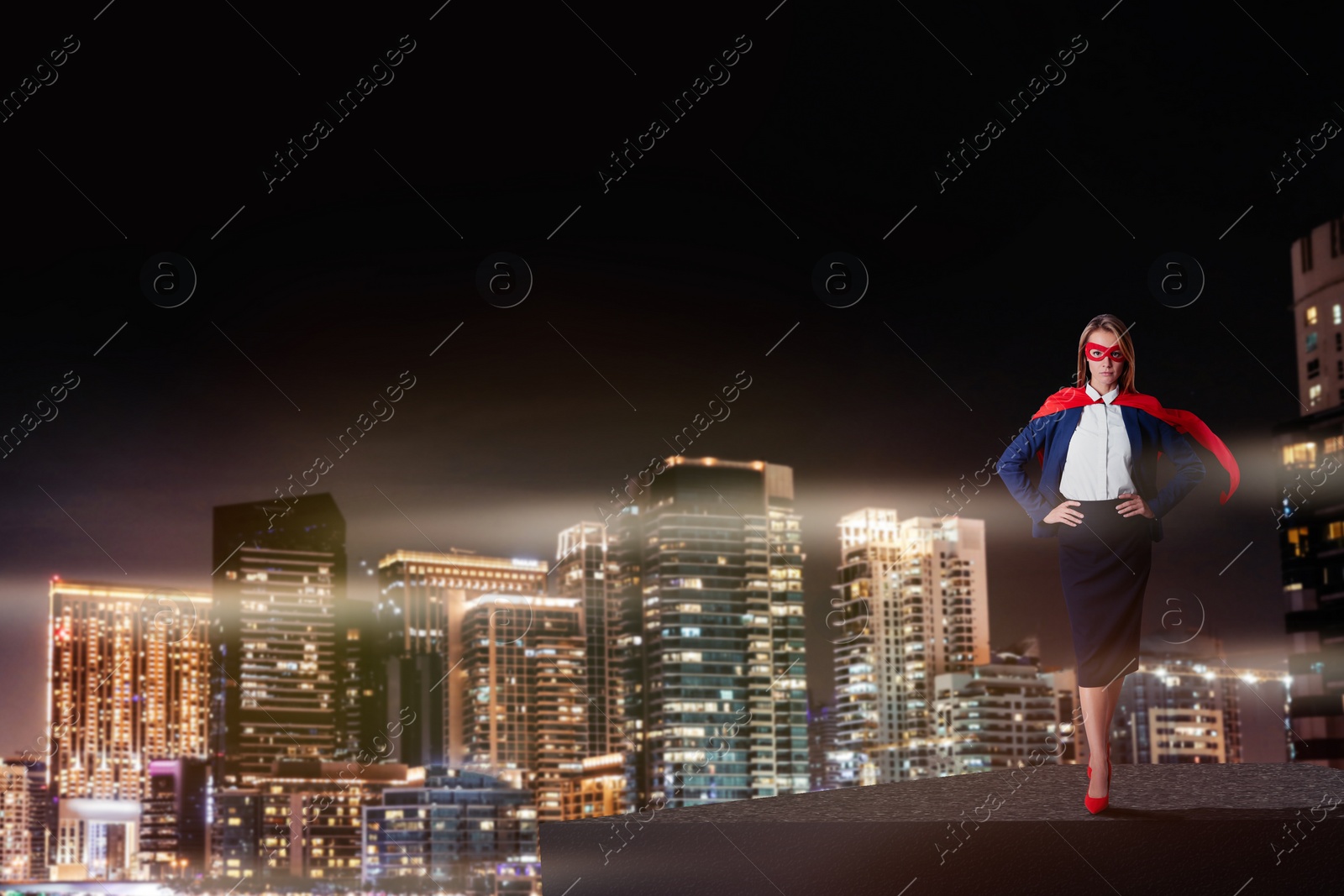 Image of Superhero, motivation and power. Woman in cape and mask on building in city