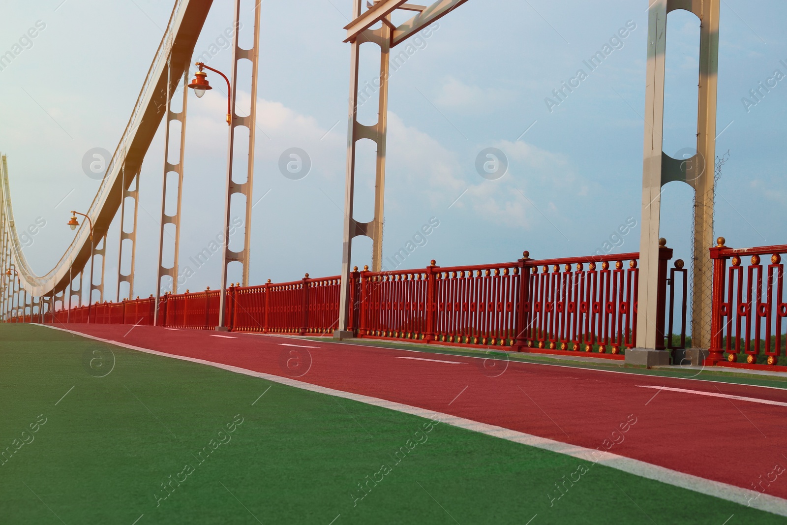 Photo of KYIV, UKRAINE - AUGUST 11, 2022: Beautiful pedestrian bridge on summer day