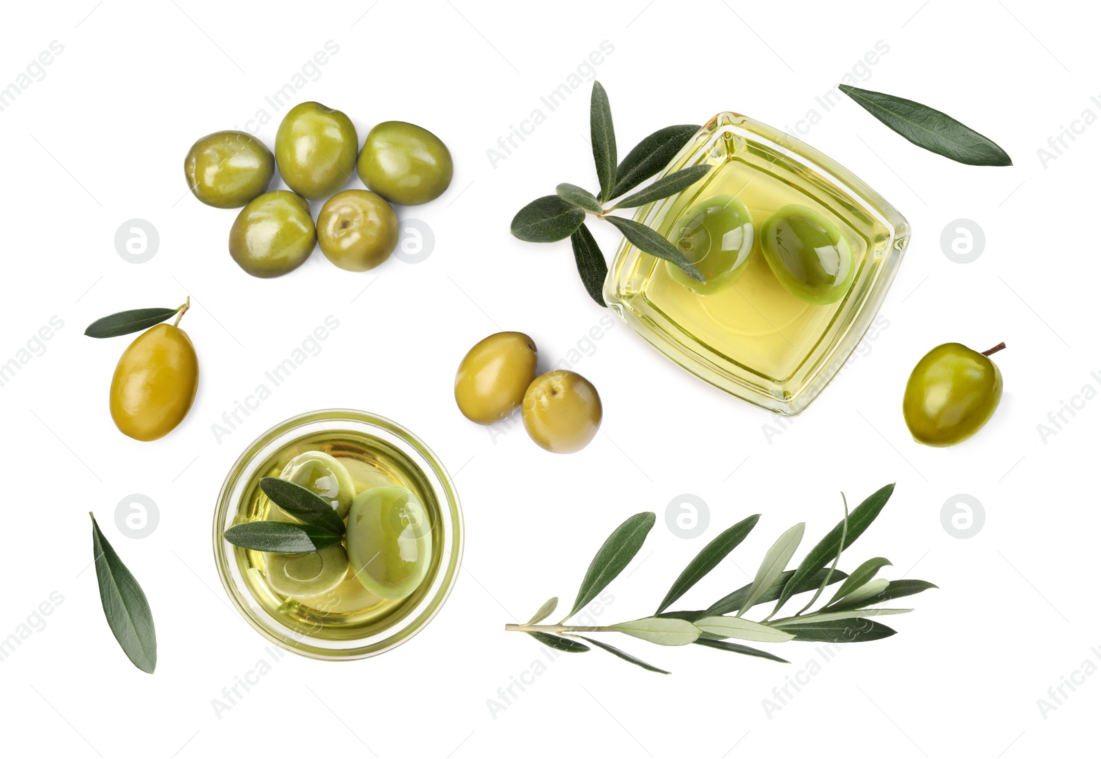 Image of Bowls of oil, ripe olives and leaves on white background, top view 