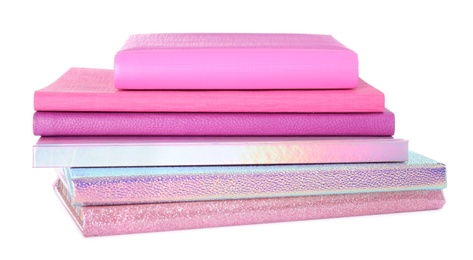 Photo of Stack of stylish notebooks on white background