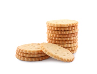 Photo of Crispy crackers on white background. Delicious snack