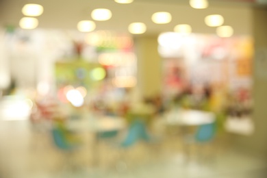 Photo of Blurred view of stylish modern cafe interior