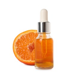 Aromatic tangerine essential oil in bottle and citrus fruit isolated on white