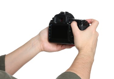 Photographer holding modern camera on white background, closeup