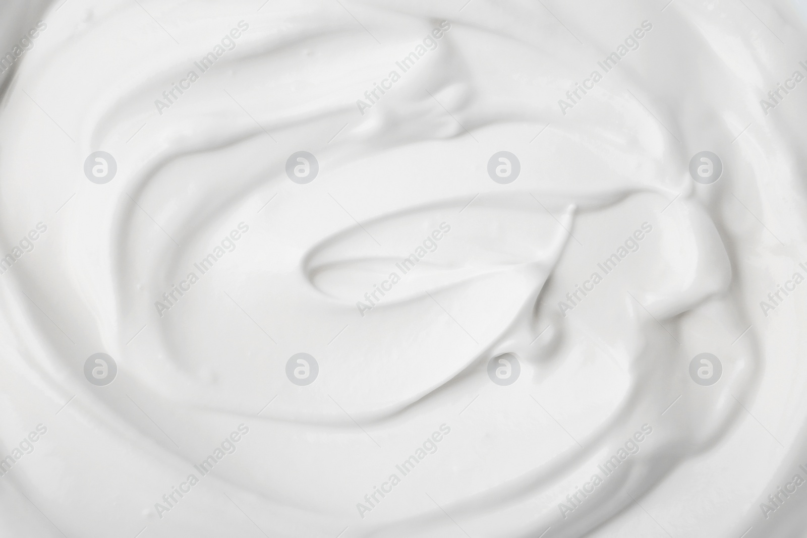 Photo of Delicious natural yogurt as background, top view