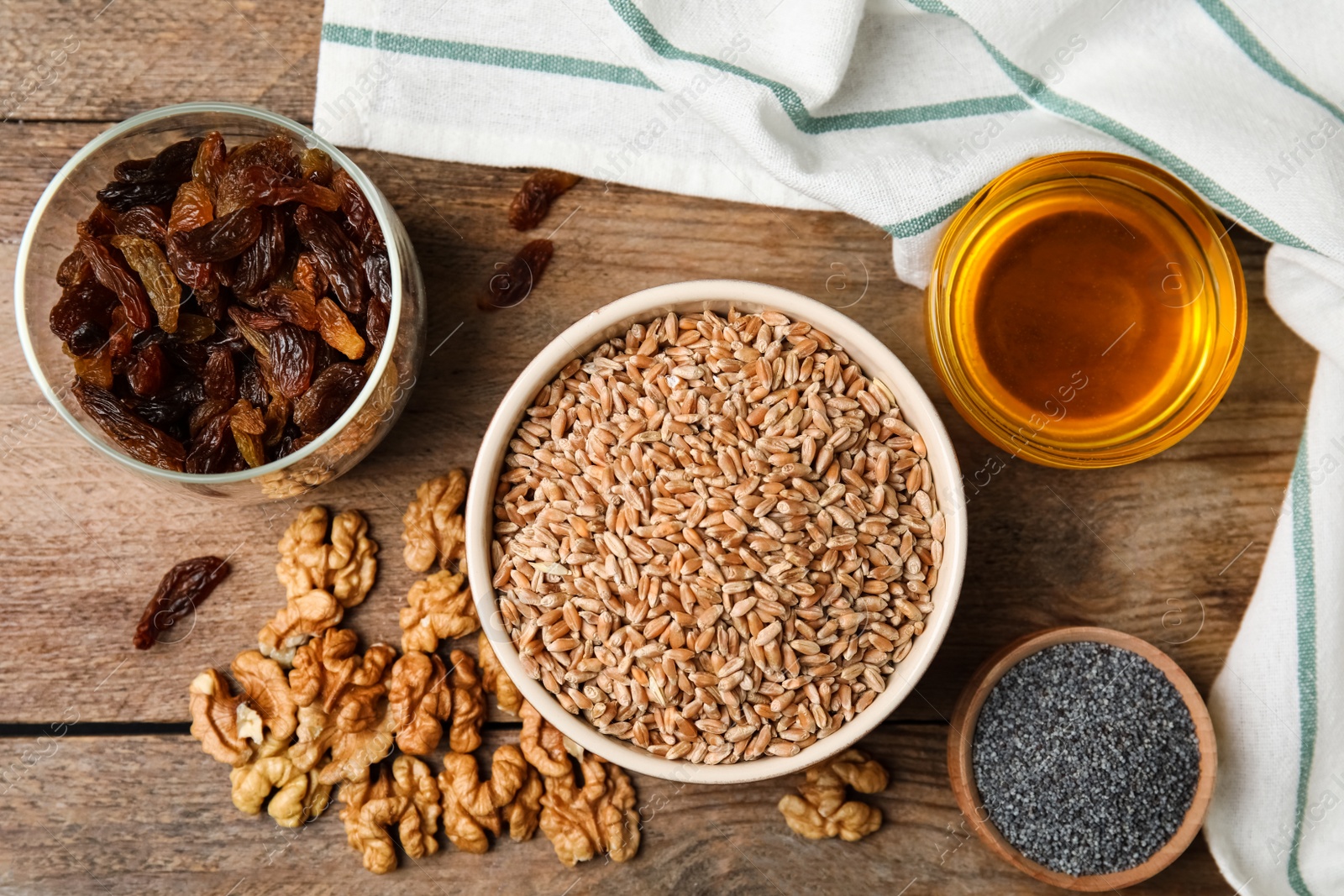 Photo of Ingredients for traditional kutia on wooden table, flat lay