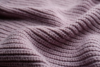 Photo of Beautiful violet knitted fabric as background, closeup