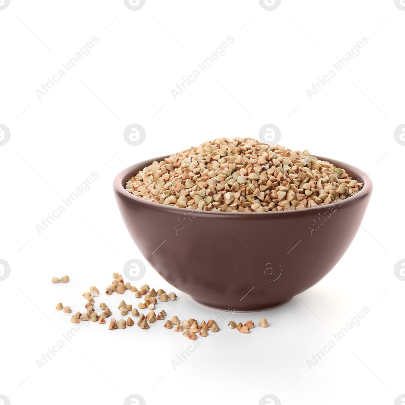 Photo of Organic green buckwheat in bowl isolated on white