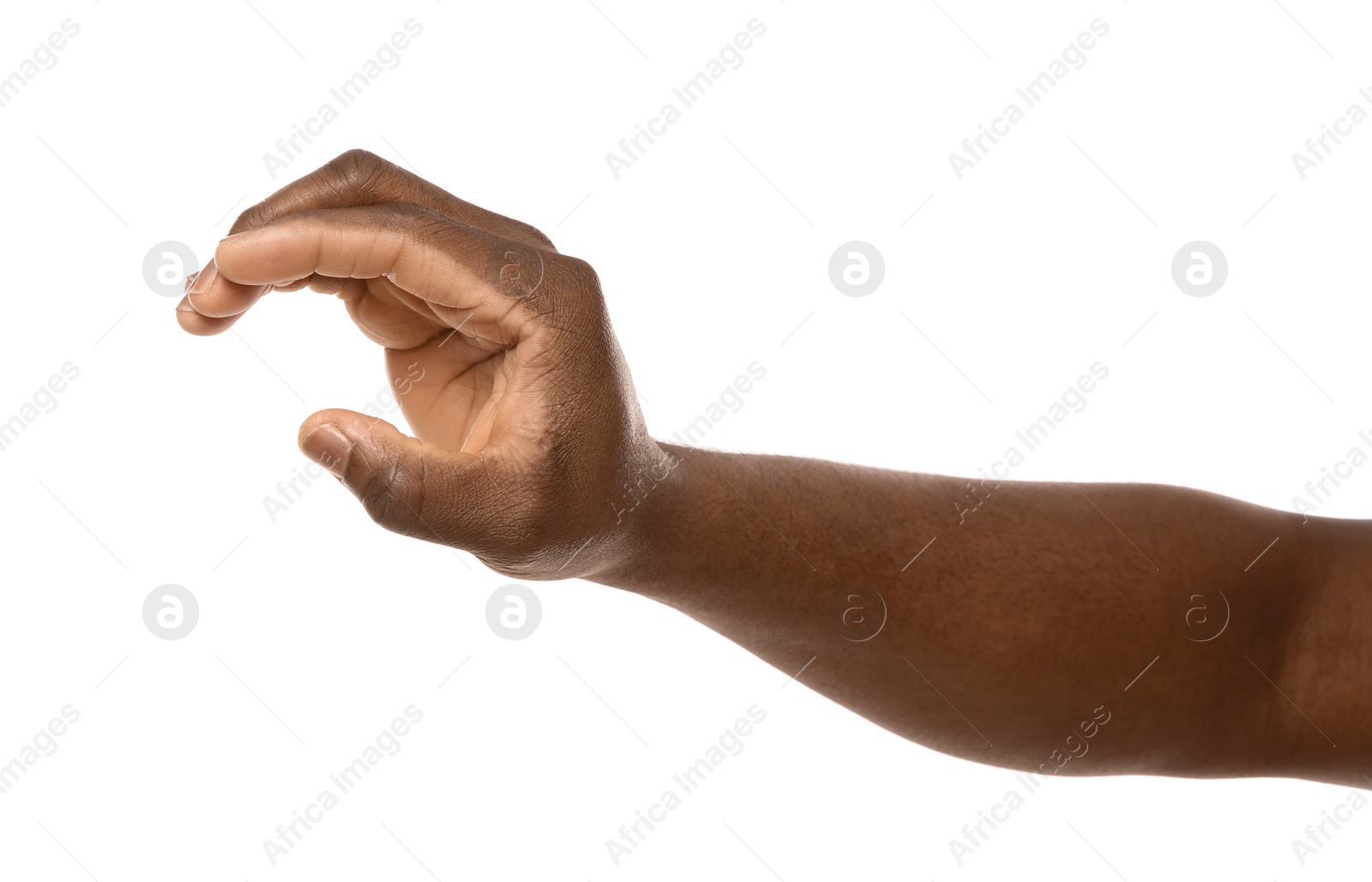 Photo of African-American man holding something in hand on white background, closeup