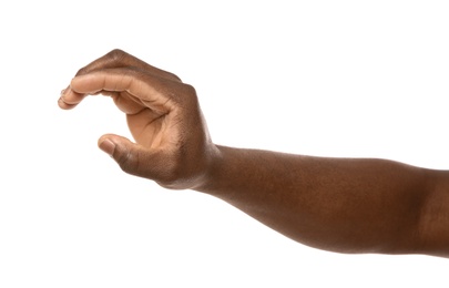 Photo of African-American man holding something in hand on white background, closeup