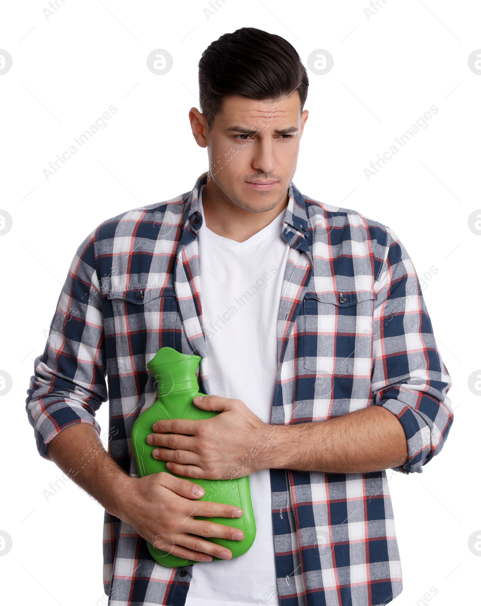 Photo of Man using hot water bottle to relieve abdominal pain on white background