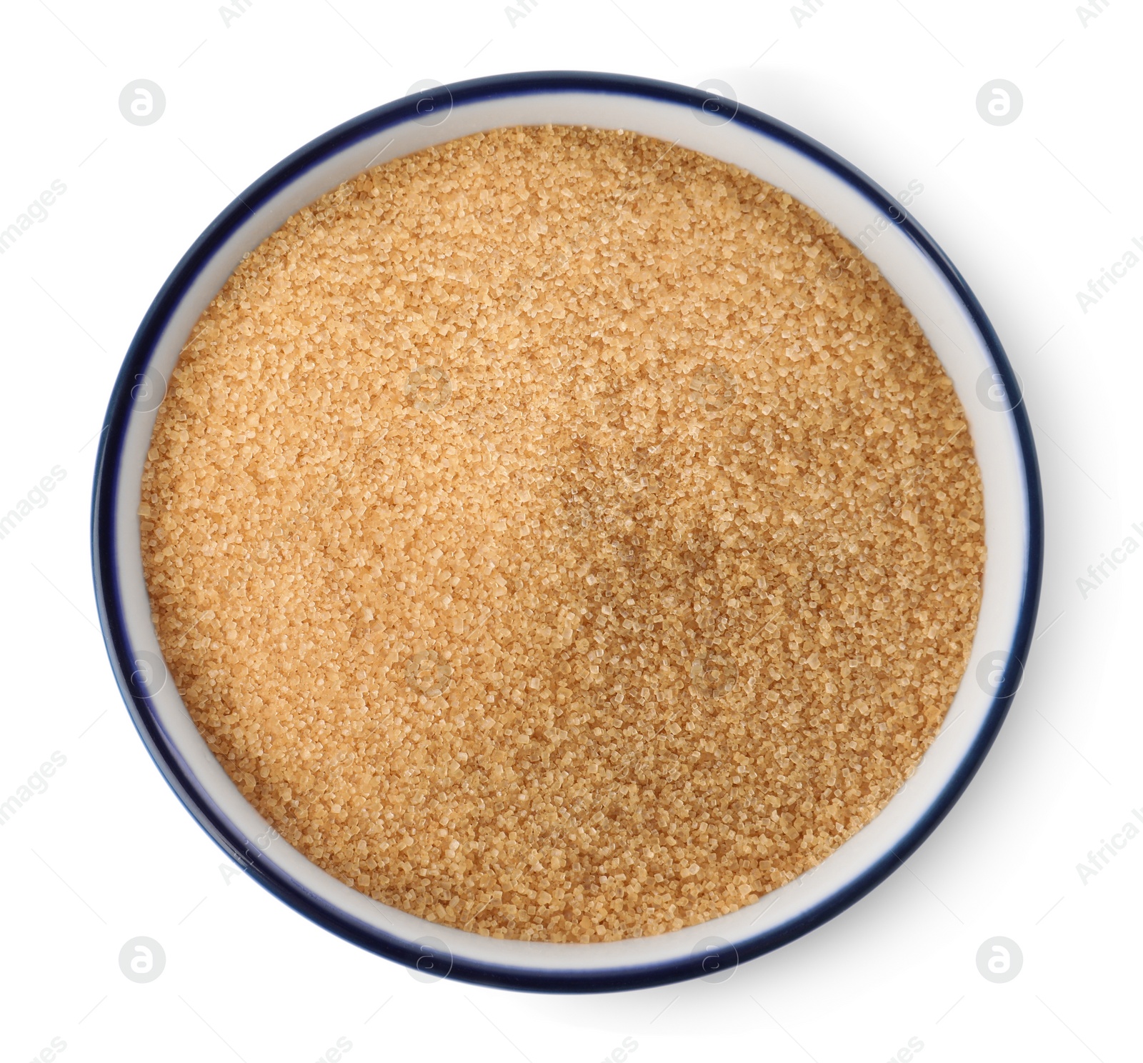 Photo of Bowl of granulated brown sugar isolated on white, top view