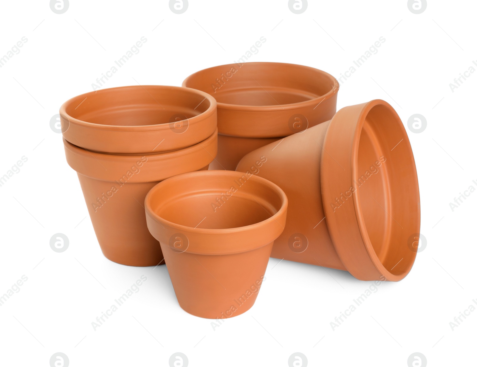 Photo of Empty clay flower pots isolated on white