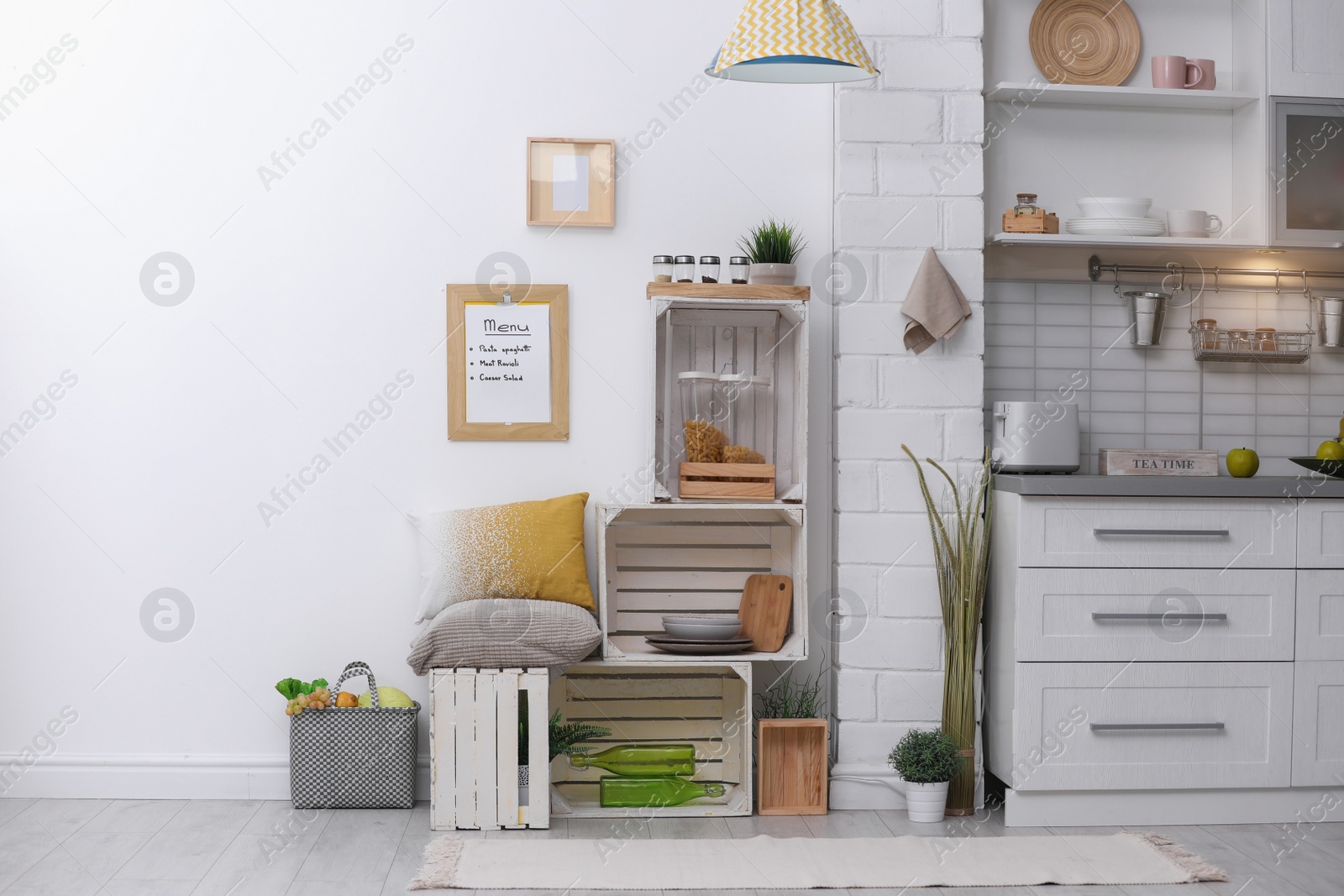 Photo of Modern kitchen interior with wooden crates as eco furniture