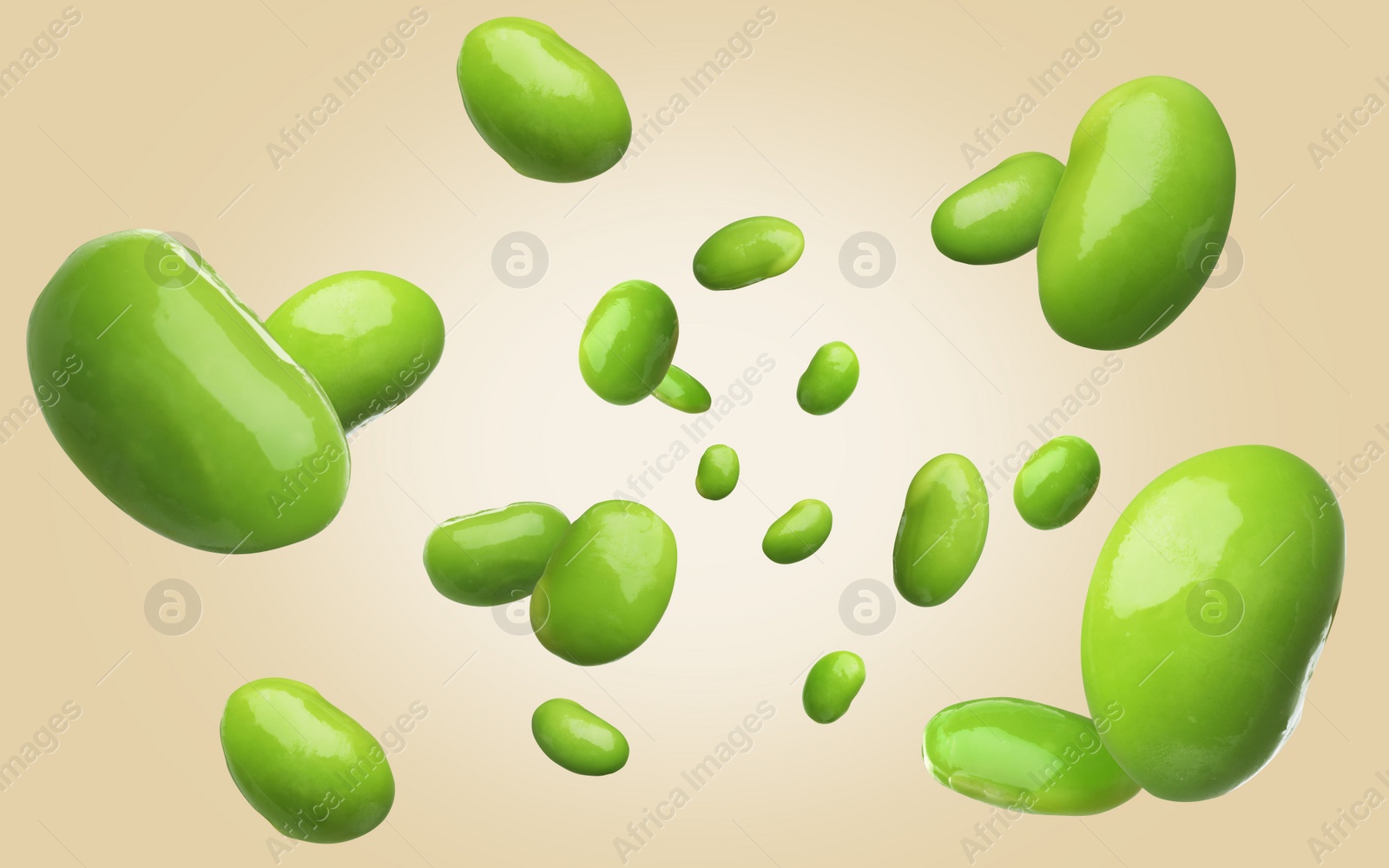 Image of Delicious edamame soybeans falling on beige background