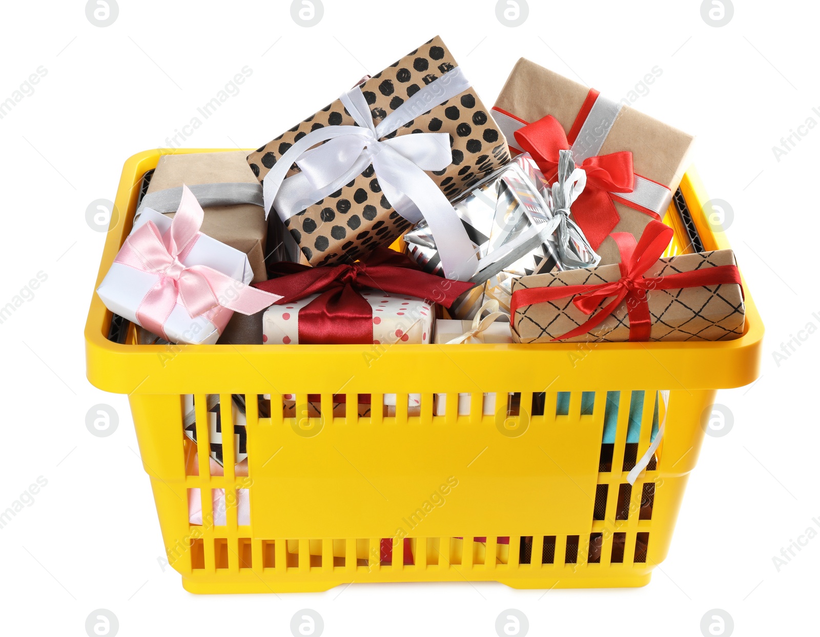 Photo of Shopping basket full of gift boxes on white background