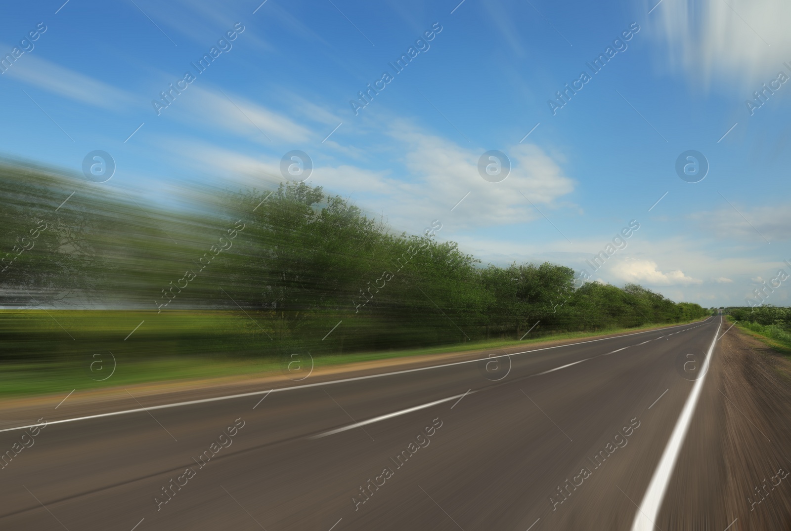 Image of Asphalt country road without transport, motion blur effect