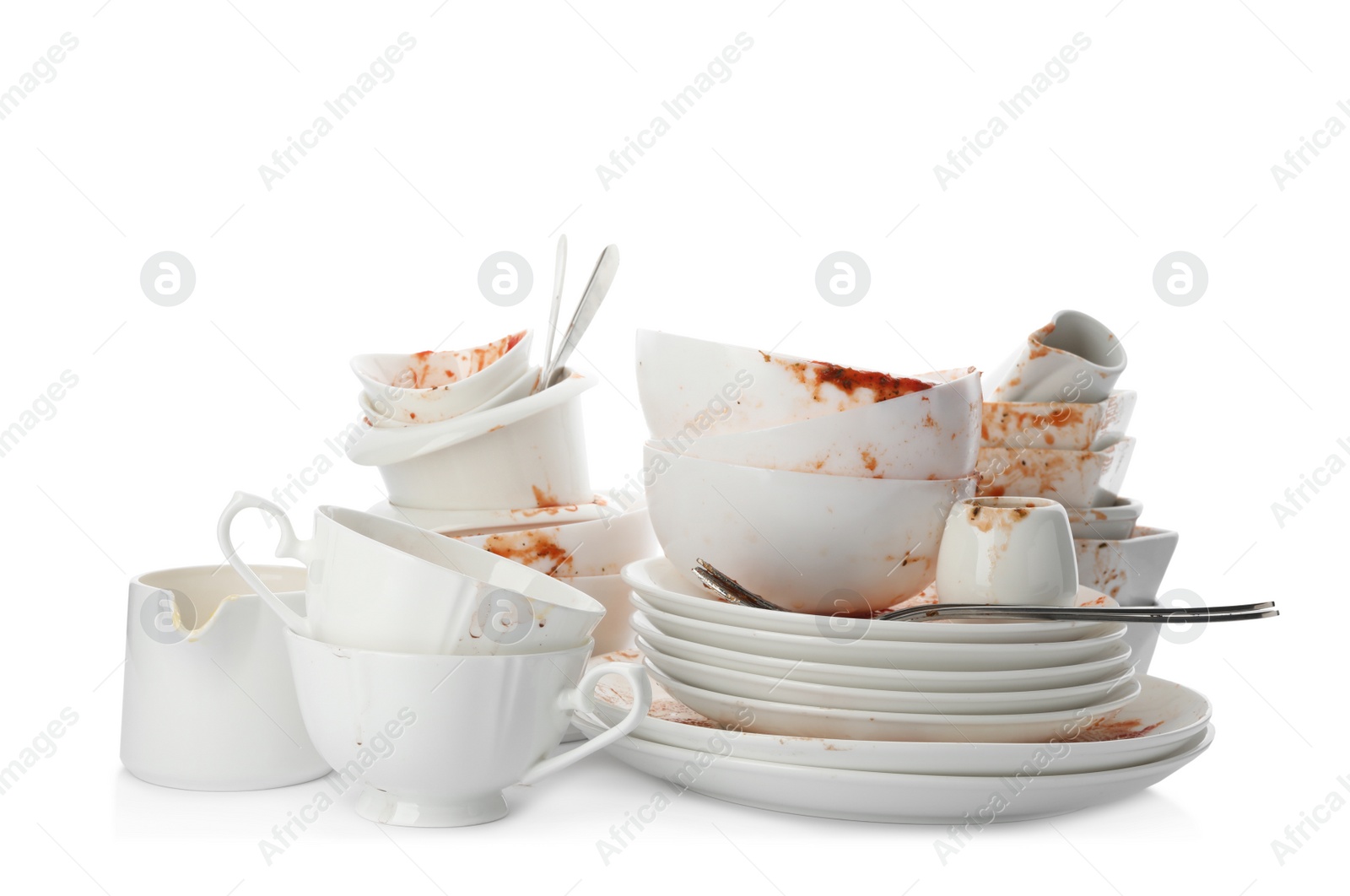 Photo of Set of dirty dishes isolated on white