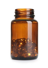 Photo of Bottle with cod liver oil capsules on white background