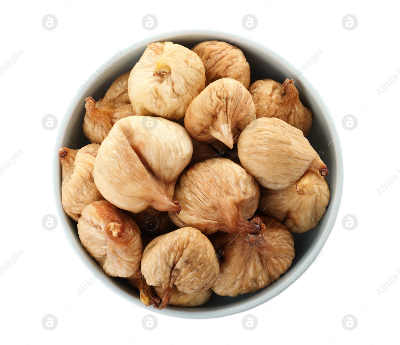 Photo of Bowl with figs on white background, top view. Dried fruit as healthy food