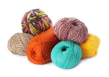 Photo of Different balls of woolen knitting yarns on white background