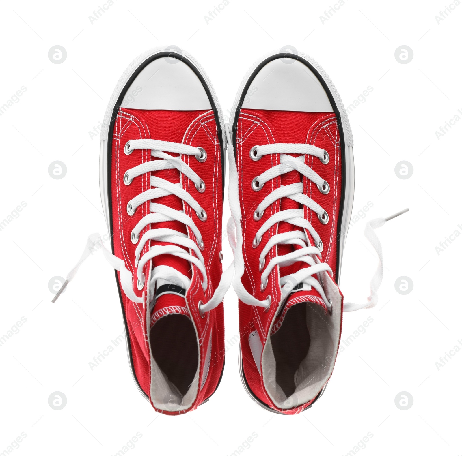 Photo of Pair of trendy sneakers isolated on white, top view
