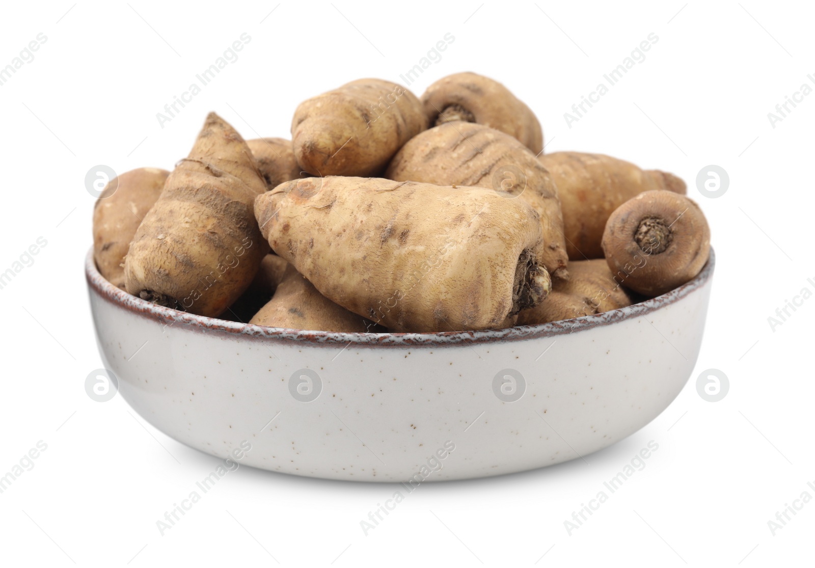 Photo of Tubers of turnip rooted chervil in bowl isolated on white