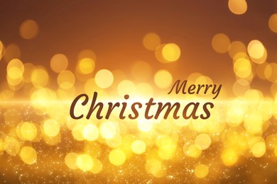 Image of Greeting card with phrase Merry Christmas on golden background with blurred lights