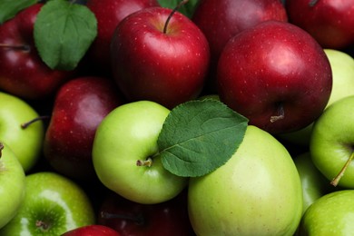 Photo of Fresh ripe green and red apples as background, top view