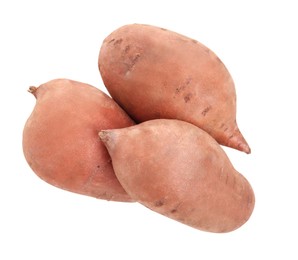 Photo of Tasty fresh sweet potatoes on white background, top view