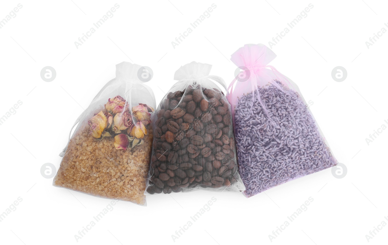 Photo of Scented sachets with dried roses, sea salt, lavender flowers and coffee beans isolated on white, top view