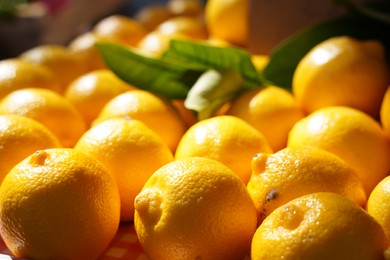 Heap of fresh yellow lemons, closeup view