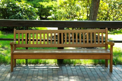 Beautiful view of wooden bench in park