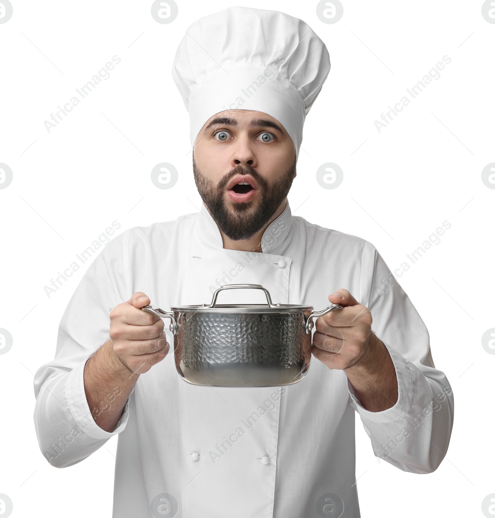 Photo of Surprised young chef in uniform holding cooking pot on white background