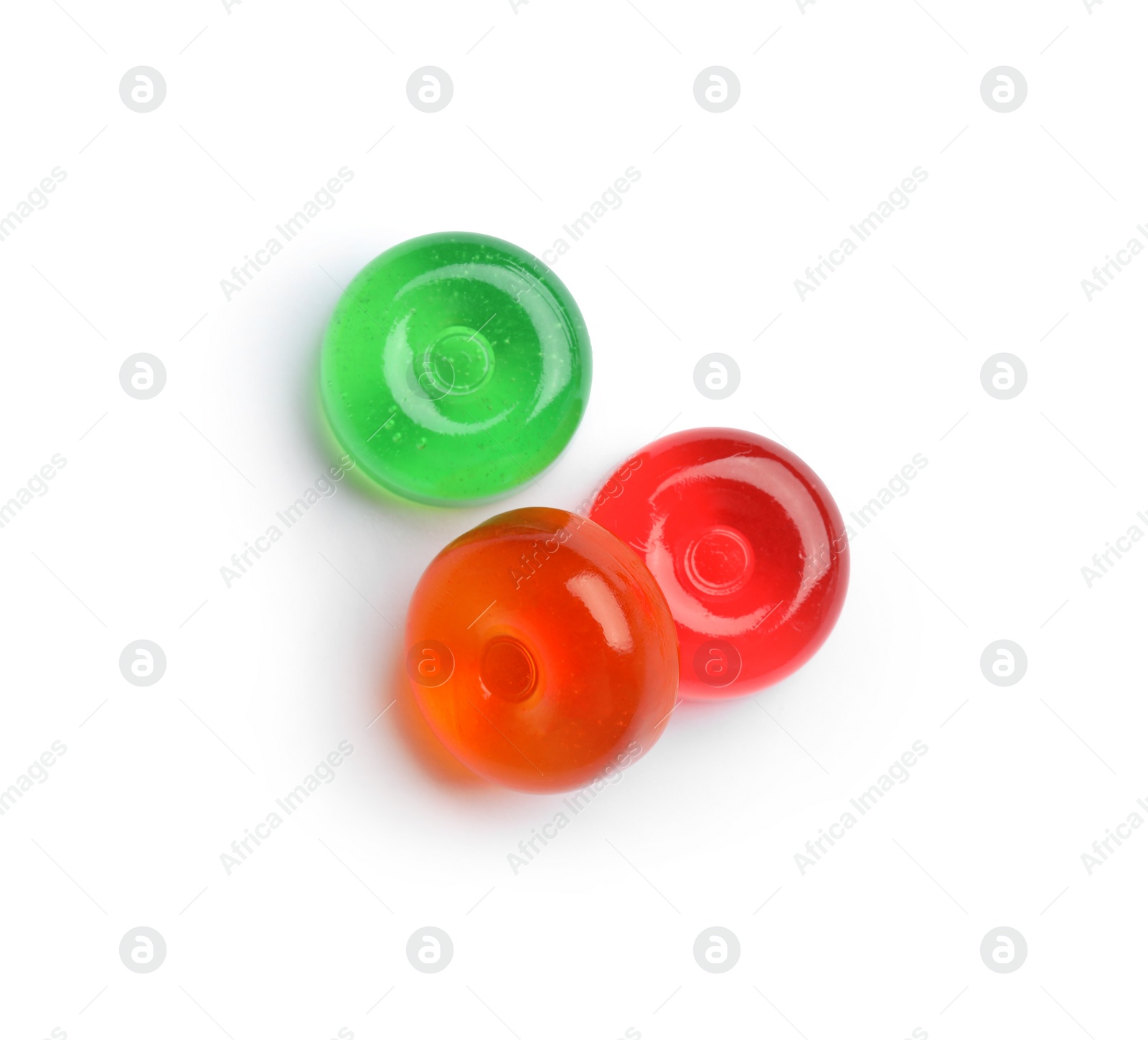 Photo of Delicious colorful candies on white background, top view