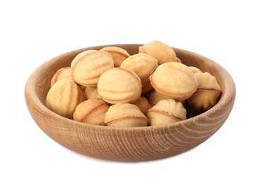 Photo of Plate of delicious nut shaped cookies with condensed milk on white background