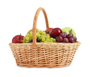 Photo of Many fresh fruits in wicker basket isolated on white