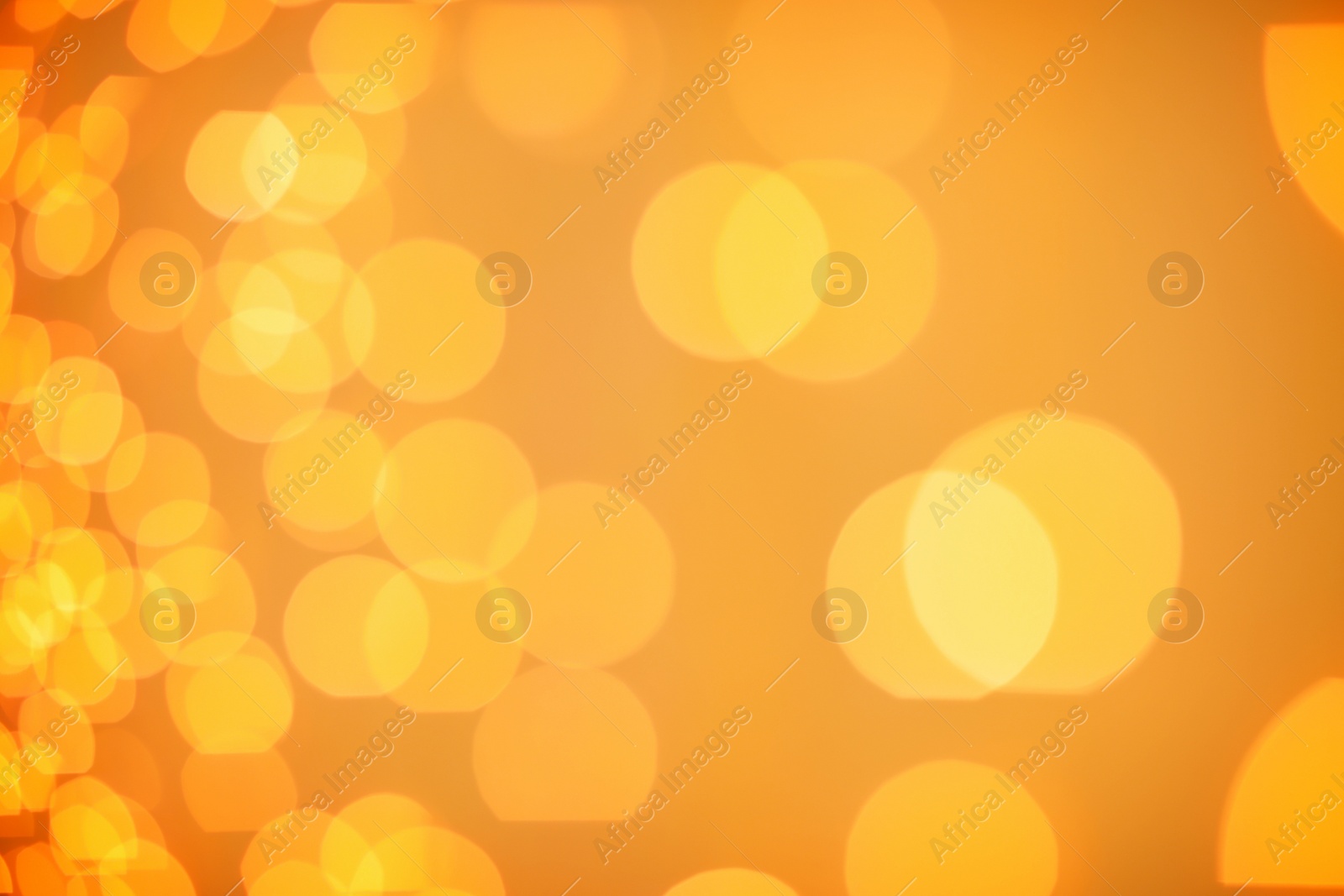 Photo of Beautiful gold lights as background. Bokeh effect