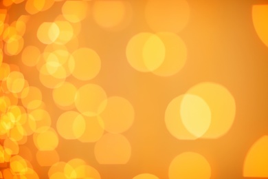 Photo of Beautiful gold lights as background. Bokeh effect