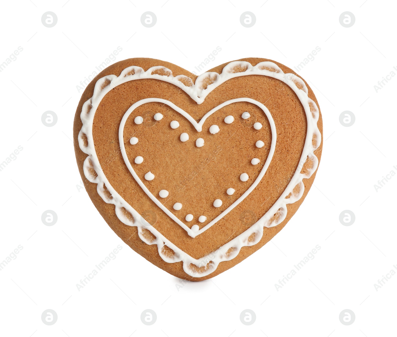 Photo of Gingerbread heart decorated with icing isolated on white