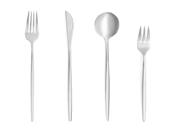 Image of Shiny silver cutlery set on white background, top view