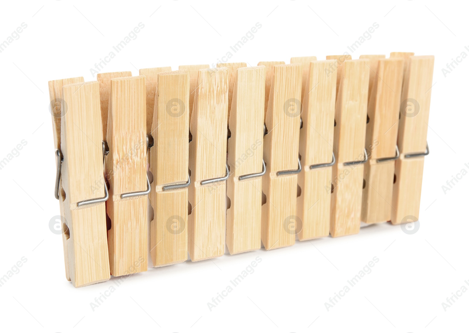 Photo of Set of wooden clothespins on white background