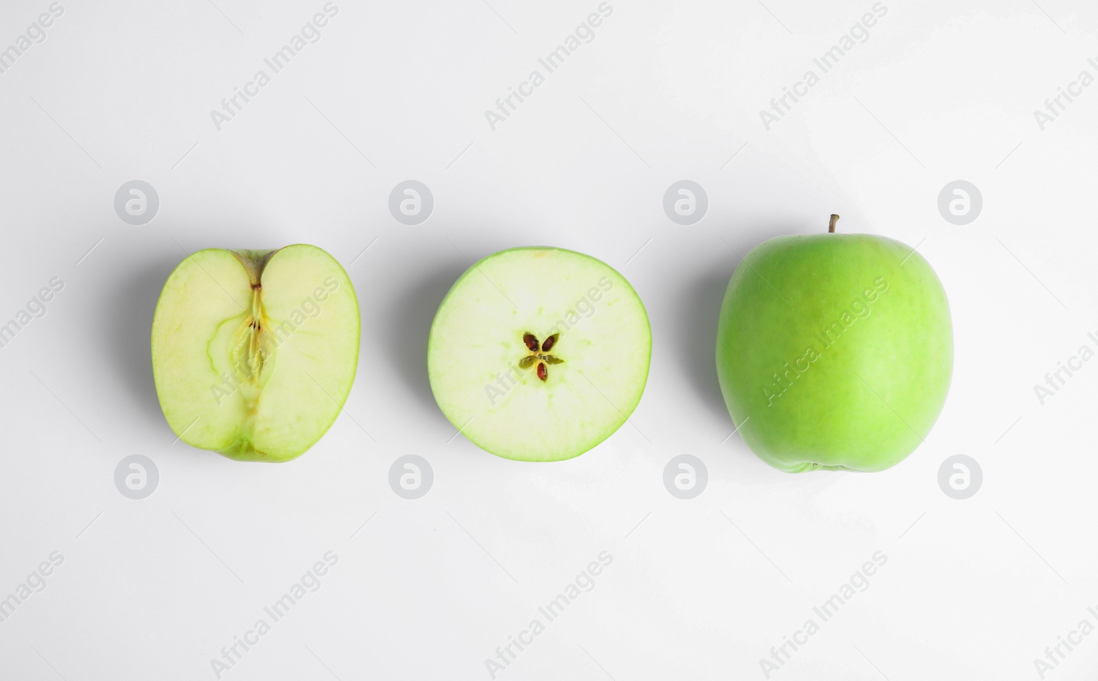 Photo of Fresh ripe green apples on white background, top view