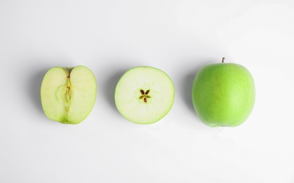 Photo of Fresh ripe green apples on white background, top view