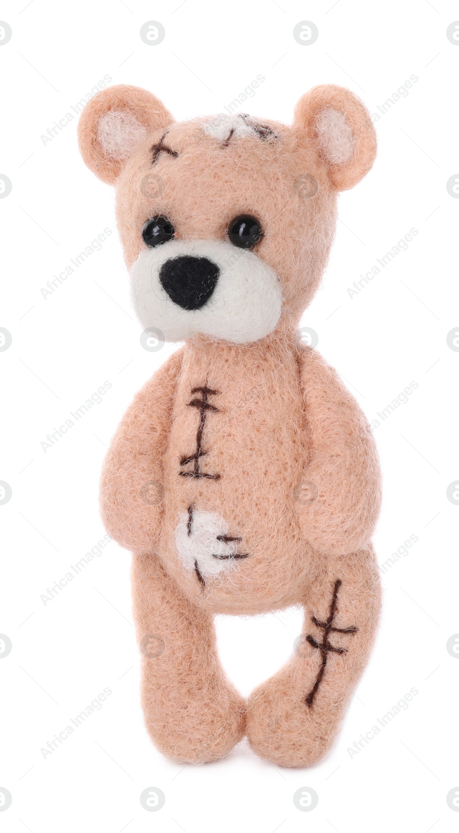 Photo of One needle felted bear isolated on white