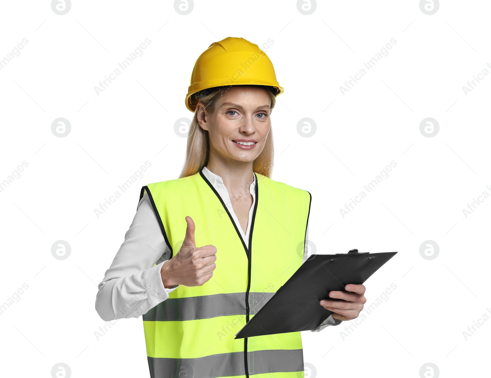 Photo of Engineer in hard hat holding clipboard and showing thumb up on white background